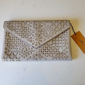 ALAÏA PARIS Large Lambskin Leather Lasercut Clutch NWT Authentic